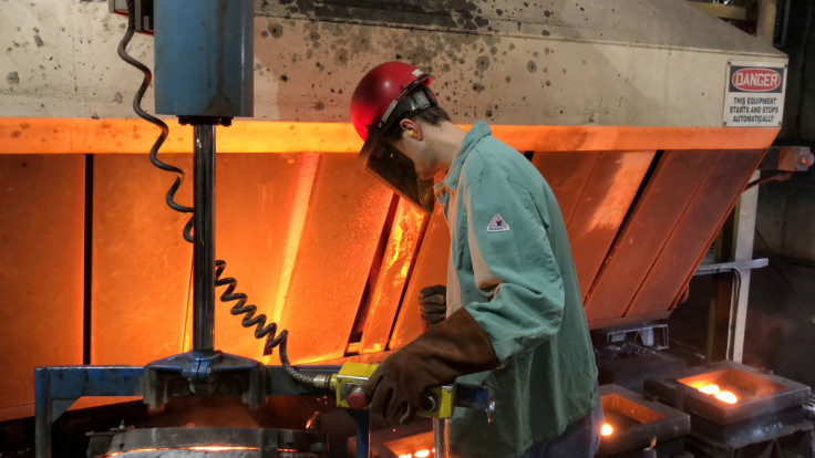 A worker pours hot metal at the Kirsh Foundry in Beaver Dam