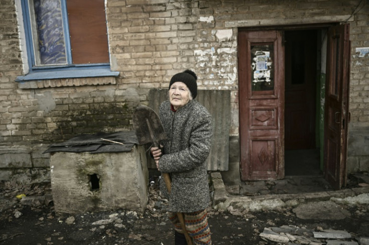 Galyna wishes she had a smaller spade to help dig holes for her flowers