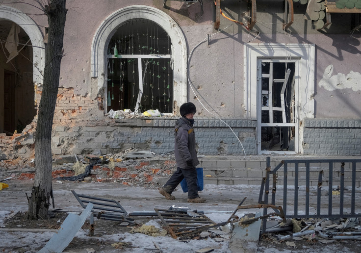 A local resident walks an empty street in Bakhmut