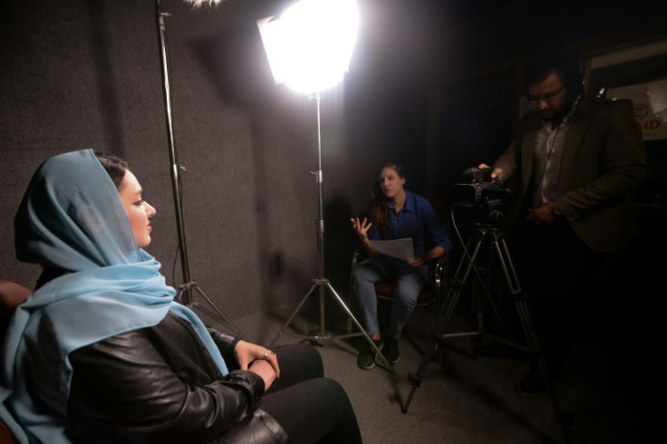An Iraqi woman shares memories of what she endured under the Islamic State group, during a filmed interview with members of the Mosul Eye project