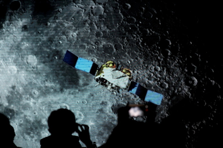 Screen shows footages of spacecraft for Chang'e-5 Mission, during an event on China’s lunar exploration program, at the National Astronomical Observatories of Chinese Academy of Sciences, in Beijing