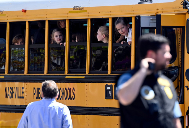 Students from the Covenant School wait to get off a bus to meet their parents following a mass shooting in Nashville