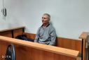 Russian citizen Alexei Moskalyov accused of discrediting the country's armed forces attends a court hearing in Yefremov