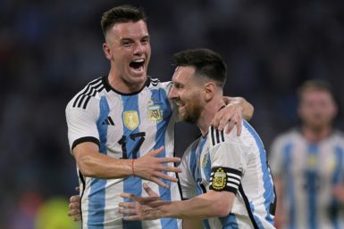 Superstar Lionel Messi (right) celebrates a goal with Argentina teammate Giovani Lo Celso during the thrashing of Curaco