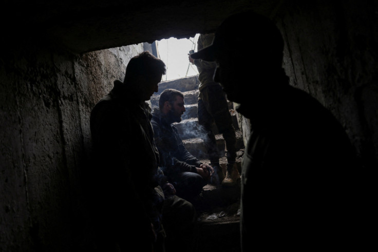 A Ukrainian tank unit crew takes cover in a bunker in Bakhmut