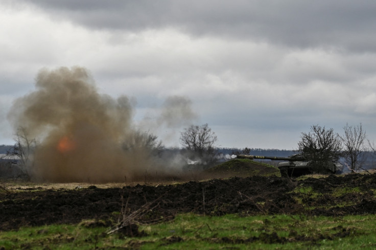 Ukrainian servicemen fire with a tank during a military training near a frontline in Zaporizhzhia region