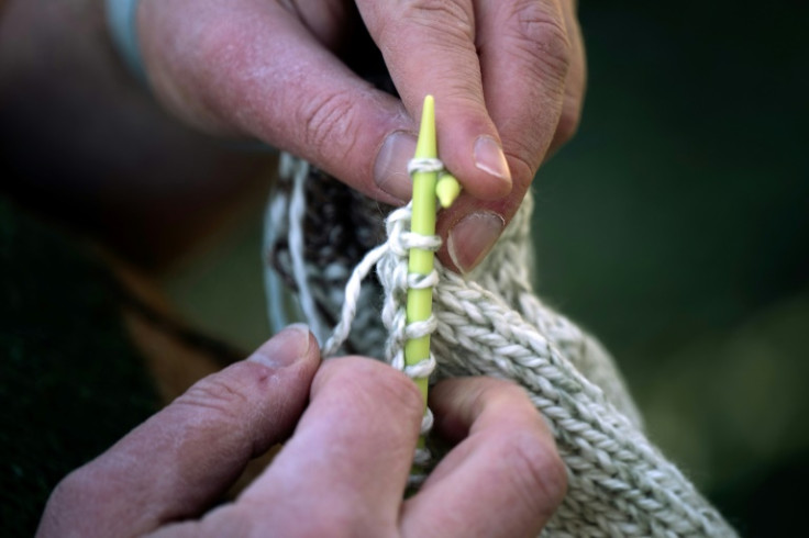 'Knitting artist' Sam Barsky works on a sweater in Cockeysville, Maryland
