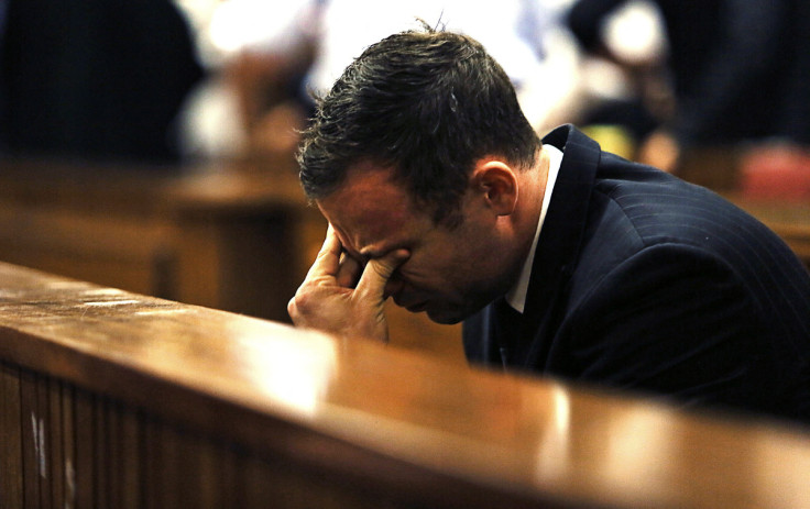 Olympic and Paralympic track star Pistorius reacts as Judge Masipa delivers her verdict at the North Gauteng High Court in Pretoria