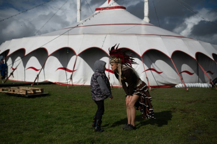 Ukrainian performer Yulia Gorodetska with her seven-year-old son Valdis