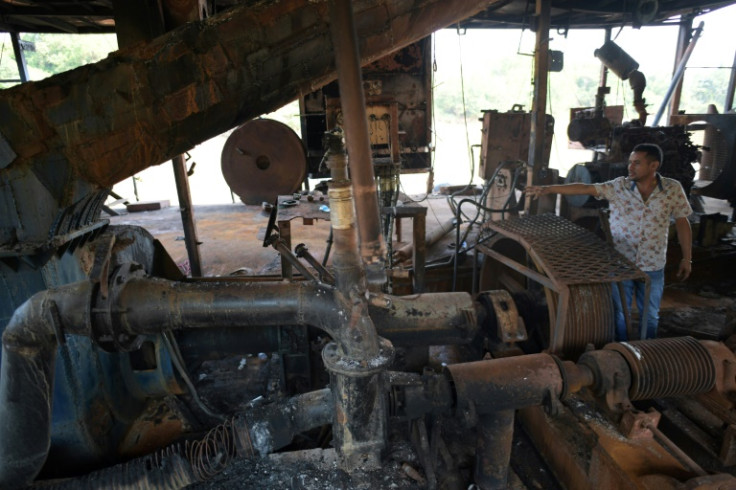 An informal miner sells gold in Colombia's El Bagre municipality