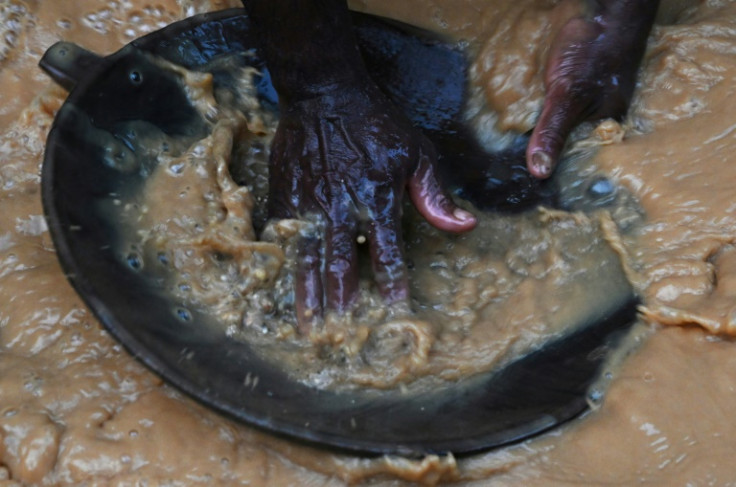 In Colombia's gold-rich Bajo Cauca region, poor communities are scouring gravelly river beds for gold with shovels, bulldozers and dredging machines