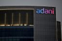 The logo of the Adani group is seen on the facade of one of its buildings on the outskirts of Ahmedabad