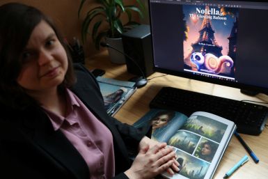 Author Kashtanova sits in their office in New York City