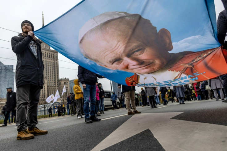 Supporters rally on April 2 in defence of Wojtyla, who was pope for 27 years