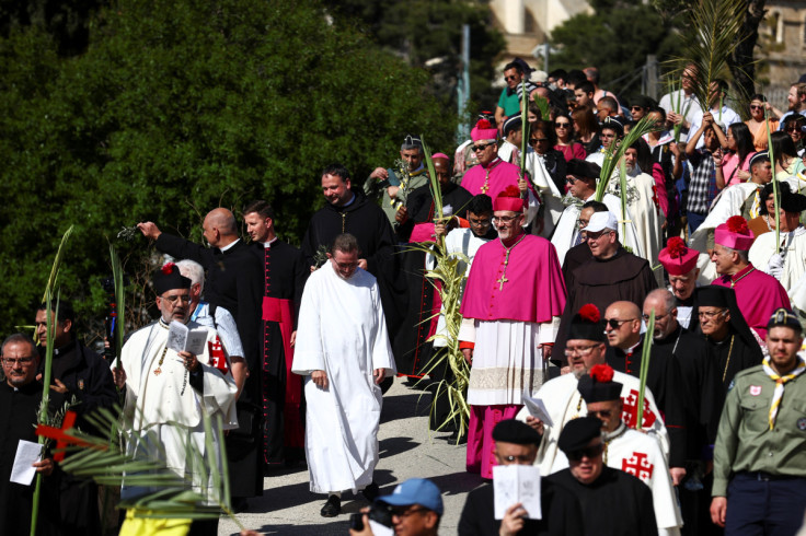 Latin Patriarch of Jerusalem Pierbattista Pizzaballa leads a Palm Sunday procession on the Mount of Olives in Jerusalem