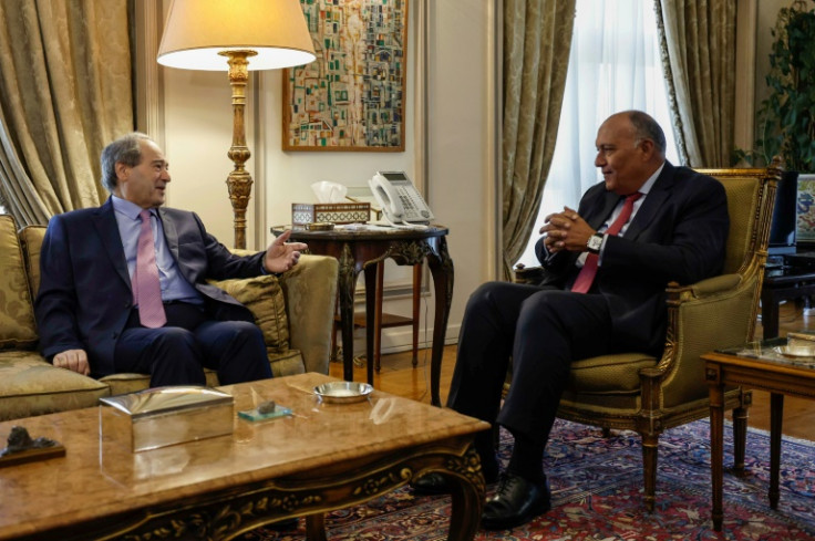 Egyptian Foreign Minister Sameh Shoukry (R) meets his Syrian counterpart Faisal Mekdad in Cairo -- reflecting increased Arab engagement with Syria's regime