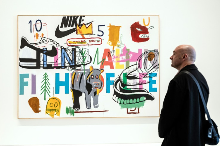 Warhol's interest in logos collides with Basquiat's street art style