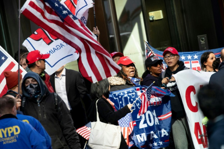 Some supporters of Donald Trump appeared outside Trump Tower after his arrival from Florida