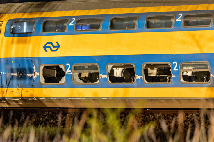 A general view shows aftermath following the derailment of a passenger train after it hit construction equipment on the track, in Voorschoten