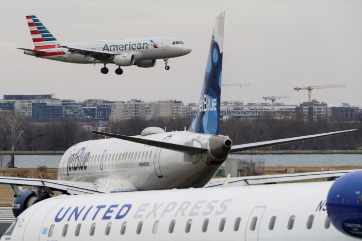 An American Airlines aircraft lands at Reagan National Airport in Arlington, Virginia