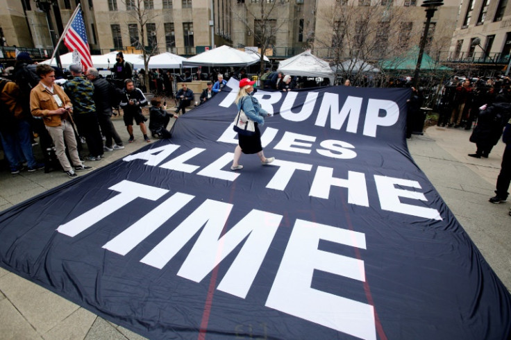 Dozens of Donald Trump supporters gathered outside the Manhattan court ahead of his unprecedented court appearance