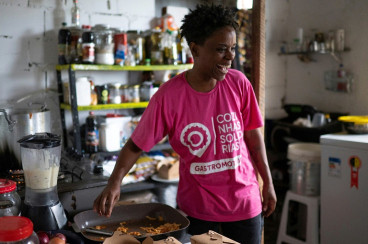 Brazilian chef Ana Lucia Costa cooks meals to be donated to low-income families in Rocinha, Rio de Janeiro's biggest favela