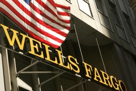 A US flag flies above Wells Fargo & Co headquarters in San Francisco