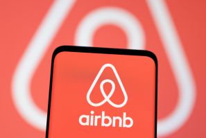 Illustration shows Airbnb logo