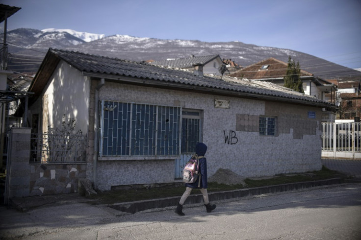 Six Serbs -- mostly teenagers -- were killed when masked gunmen stormed the Panda cafe in the quiet town of Peja in southwest Kosovo in 1998