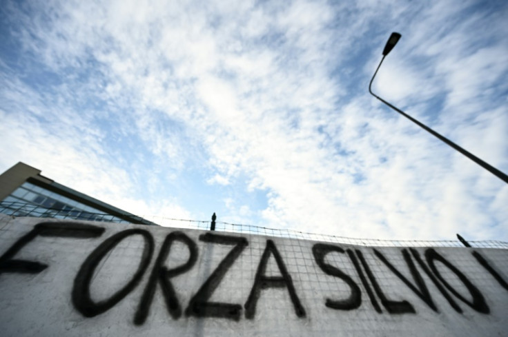 Fans from the Berlusconi-owned football club Monza unravelled a banner outside the hospital reading, "Forza Silvio! Monza is with you"