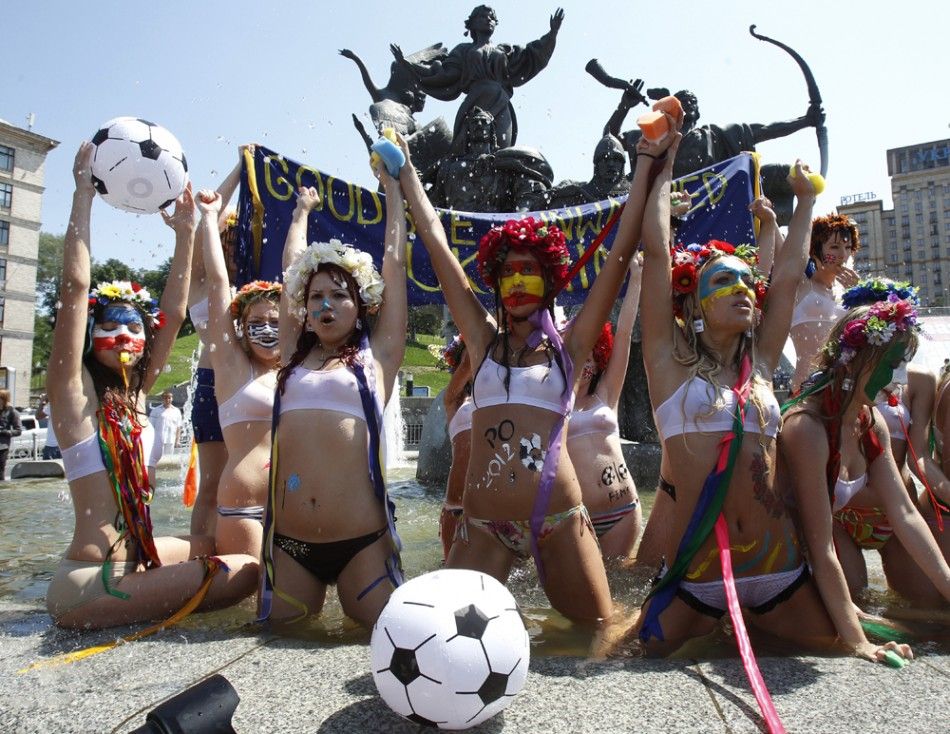 Activists from the womens rights organization quotFemenquot stage a protest in a fountain