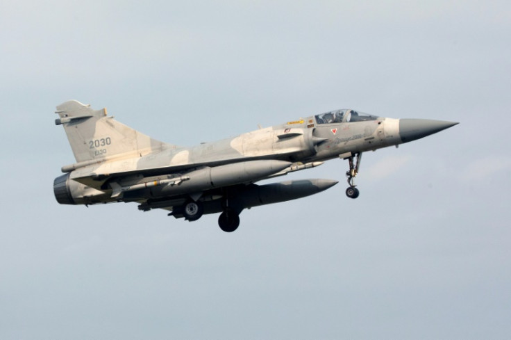 A Taiwanese Mirage fighter jet prepares to land at an air force base in Hsinchu as Taipei said it was closely monitoring Beijing's actions