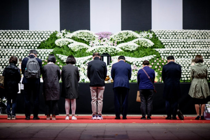 Even a public memorial altar for victims of the Itaewon crush has been targeted for abuse