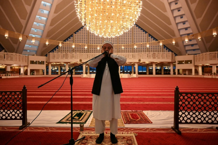 Intoned in Arabic over minaret loudspeakers, the call to prayer reminds Muslims: "God is the greatest"