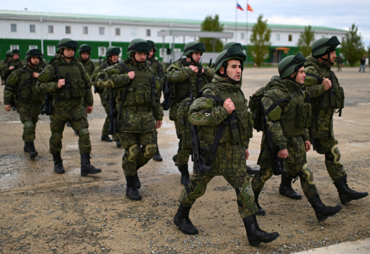 Russian reservists attend a ceremony before deployment to military units, in Rostov region