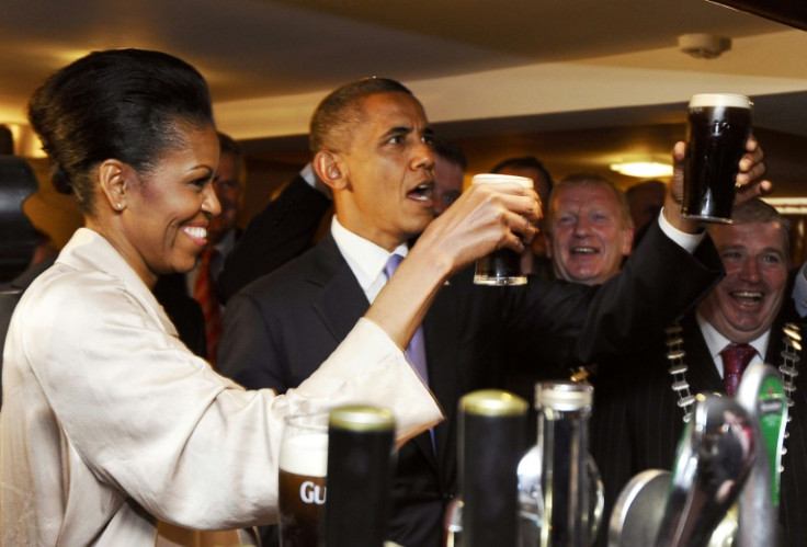 US President Barack Obama (2ndL) and First Lady Michelle Obama (L) visited Moneygall where his great-great-great grandfather hailed from