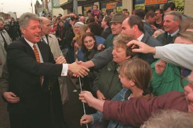 President Bill Clinton met Shankill Road residents during a stroll through Belfast in 2002