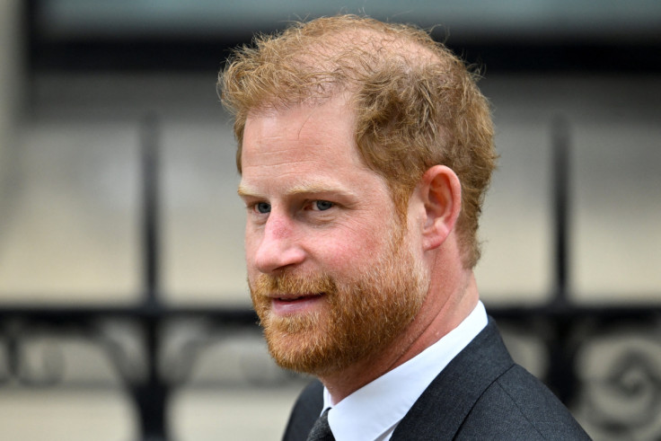 Britain's Prince Harry walks outside the High Court, in London