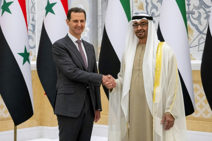 Emirati President Sheikh Mohamed bin Zayed al-Nahyan, on the right, welcomes his Syrian counterpart Bashar al-Assad in Abu Dhabi on March 19, 2023