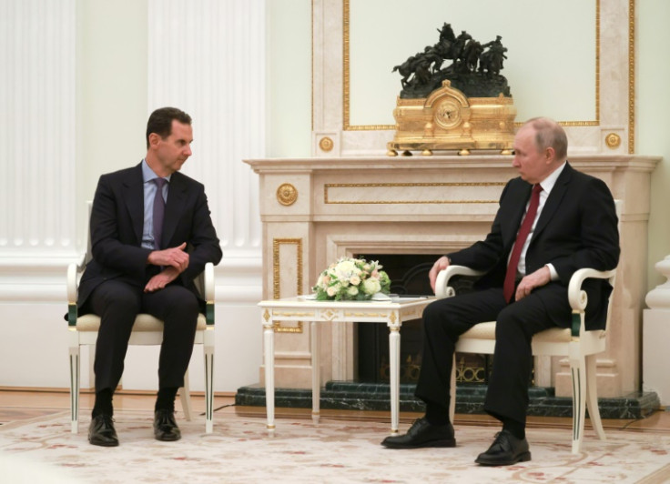 Russian President Vladimir Putin meets with his Syrian counterpart Bashar al-Assad at the Kremlin in Moscow on March 15, 2023