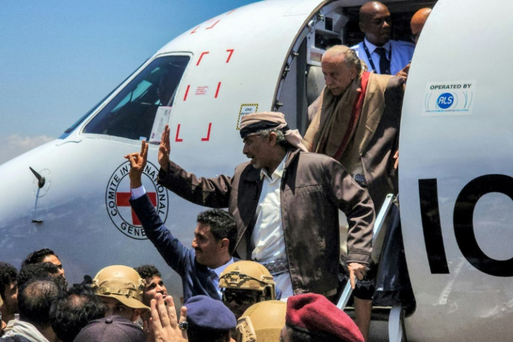 The former defence minister in Yemen's internationally recognised government, Mahmud al-Subaihi (C) and a brother of its former president, Nasser Mansur al-Hadi (top), were the most high-ranking prisoners released by the rebels in the exchange