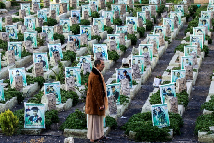 A Yemeni makes a Ramadan visit to war graves in the rebel-held capital Sanaa. Hundreds of thousands of people have been killed in the conflict, directly or indirectly, the United Nations says