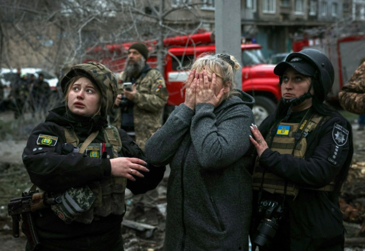 The strike on the quiet neighbourhood came as Russian President Vladimir Putin signed a bill that will make it easier to mobilise citizens into the army and block them from fleeing the country if drafted