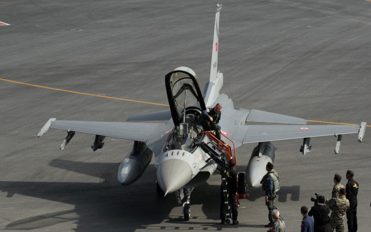 Turkish Defence Minister Hulusi Akar gets off from an Air Force F16 jet after landing at a new airport under construction in Istanbul