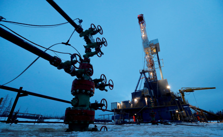 A well head and drilling rig in the Yarakta oilfield in Russia