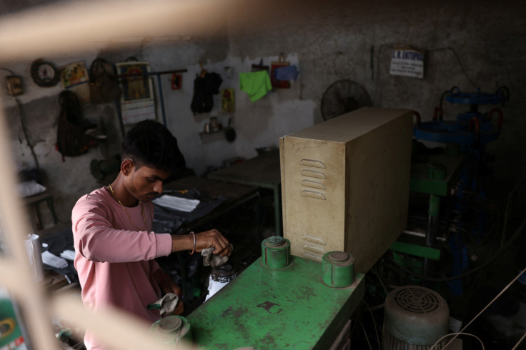 21-year-old aspiring college student and migrant worker Sujeet Kumar works at his brother-in-law Sunil Kumar's factory which manufactures rubber sealants for pressure cookers, on the outskirts of Mumbai,
