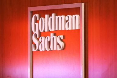 Goldman Sachs reported lower profits on a slowdown in merger advising and weak trading results