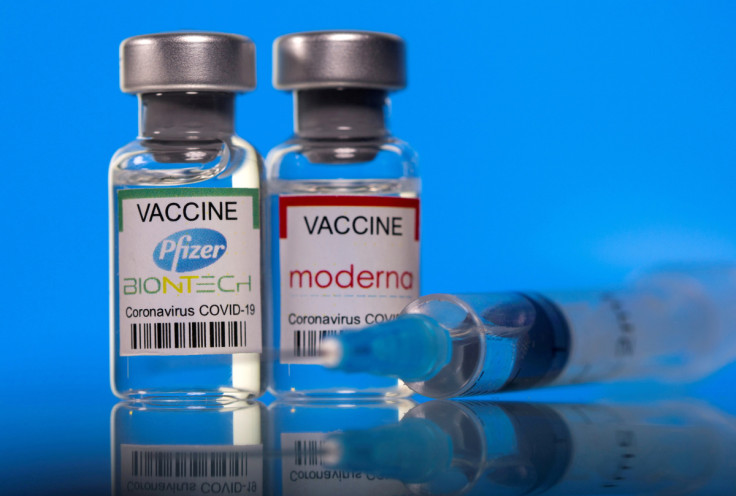 Picture illustration of vials with Pfizer-BioNTech and Moderna coronavirus disease (COVID-19) vaccine labels