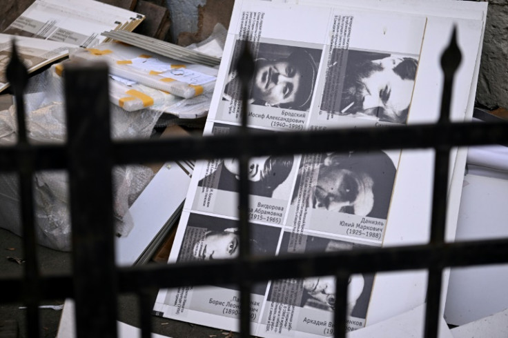 Portraits of Soviet human right activists, including Nobel prize laureates Joseph Brodsky and Boris Pasternak, are seen on a garbage dump outside the Andrei Sakharov Museum and Public Centre in Moscow
