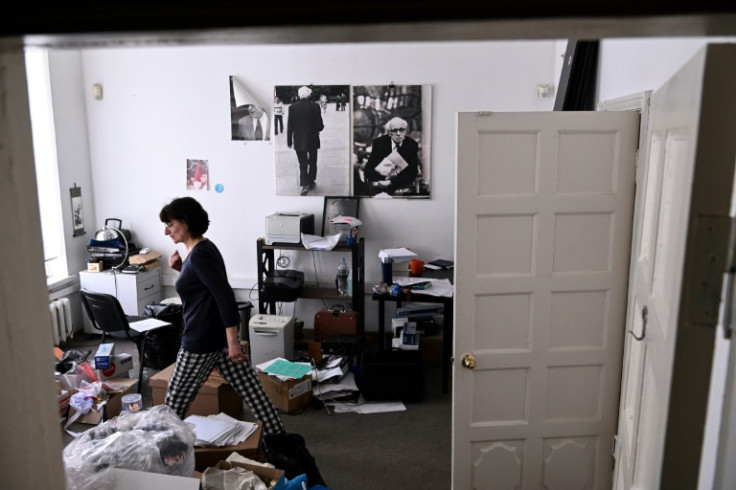 An employee packs items in the Andrei Sakharov Museum and Public Centre in Moscow